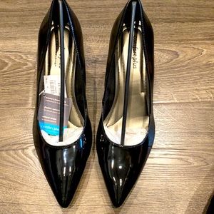 Black patten leather pumps
